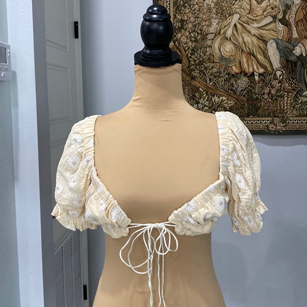 Europa cream colored floral tie front crop top.